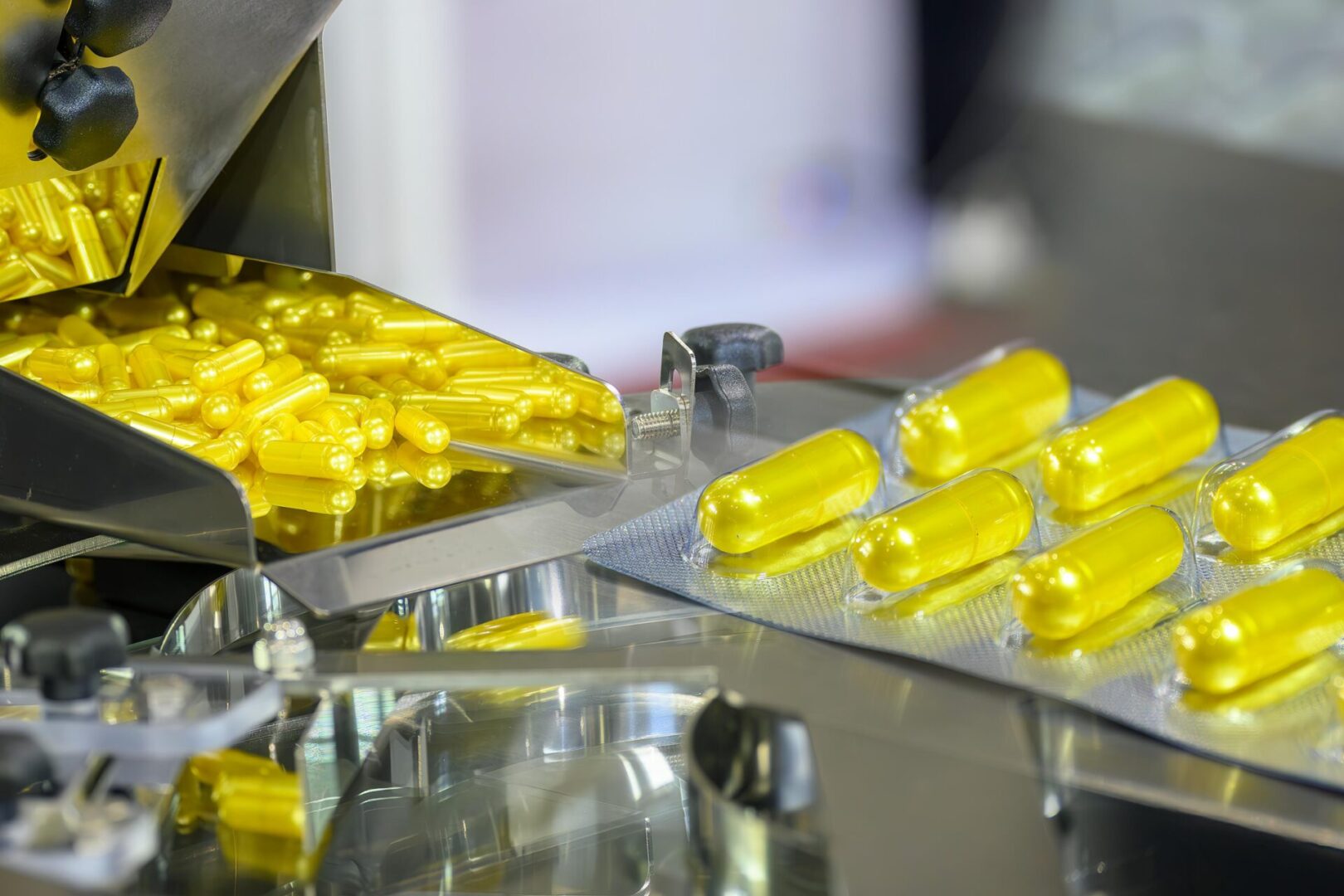 A machine that is making yellow candy.